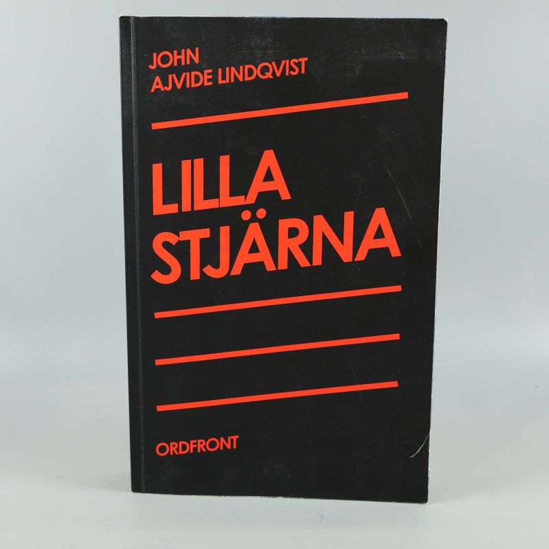 Framsida av boken Lilla Stjärna med svart och orange omslag