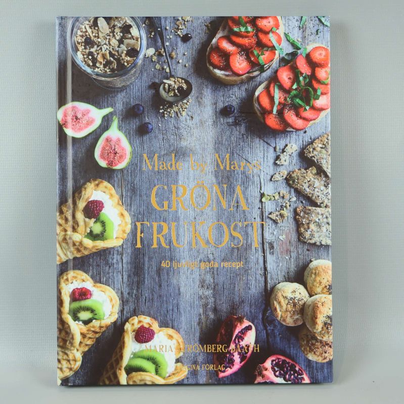 Framsidan av kokboken Made by Marys gröna frukost med färgglada frukostar