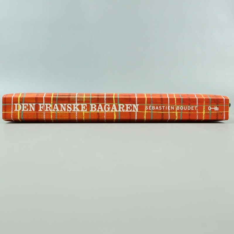 Bokrygg med titeln Den franske bagaren och Sébastien Boudet
