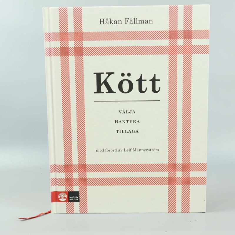 Framsida av kokboken Kött med rutigt mönster och tydlig titel