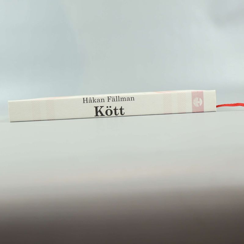 Bokens rygg med titel Kött och författare Håkan Fällman