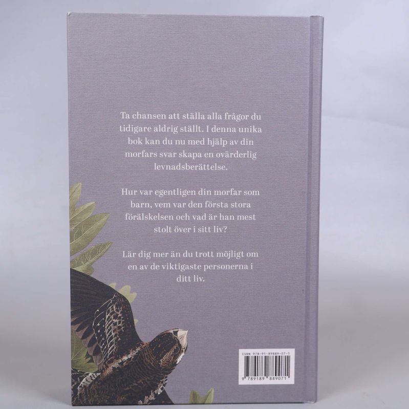 Baksidan av boken Morfar Berätta om ditt liv med beskrivande text och ISBN
