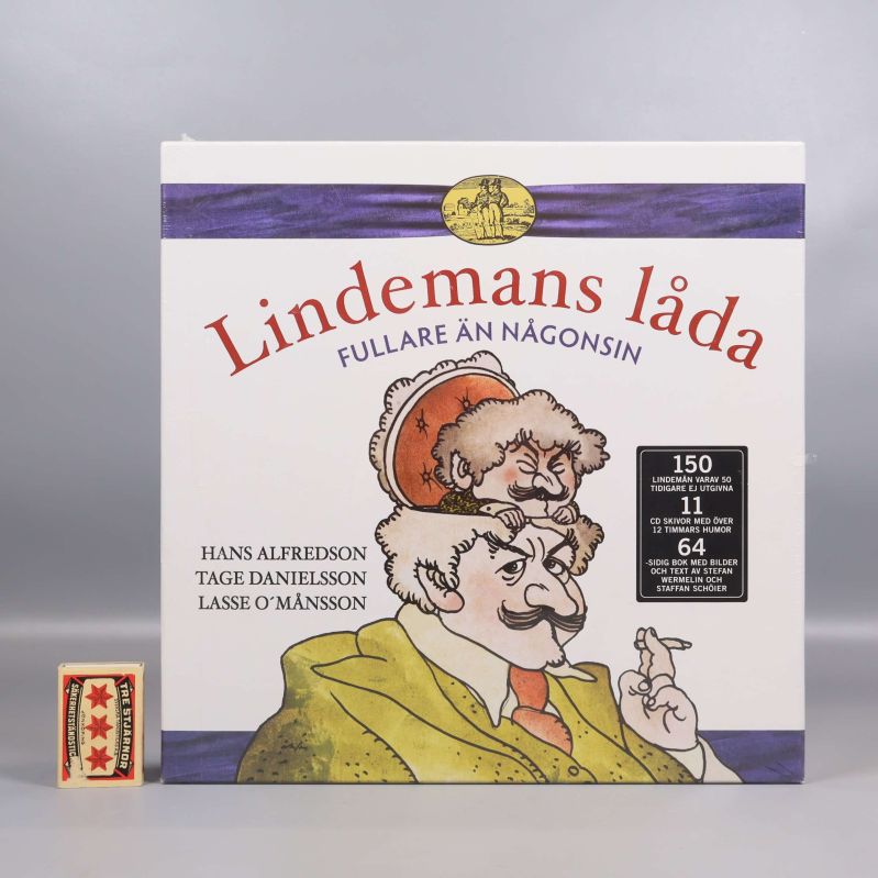 Lindemans låda box bredvid ett tändsticksask för storleksjämförelse