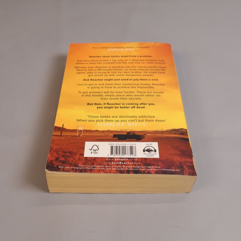 Bokens baksida med sammanfattning och ISBN-nummer