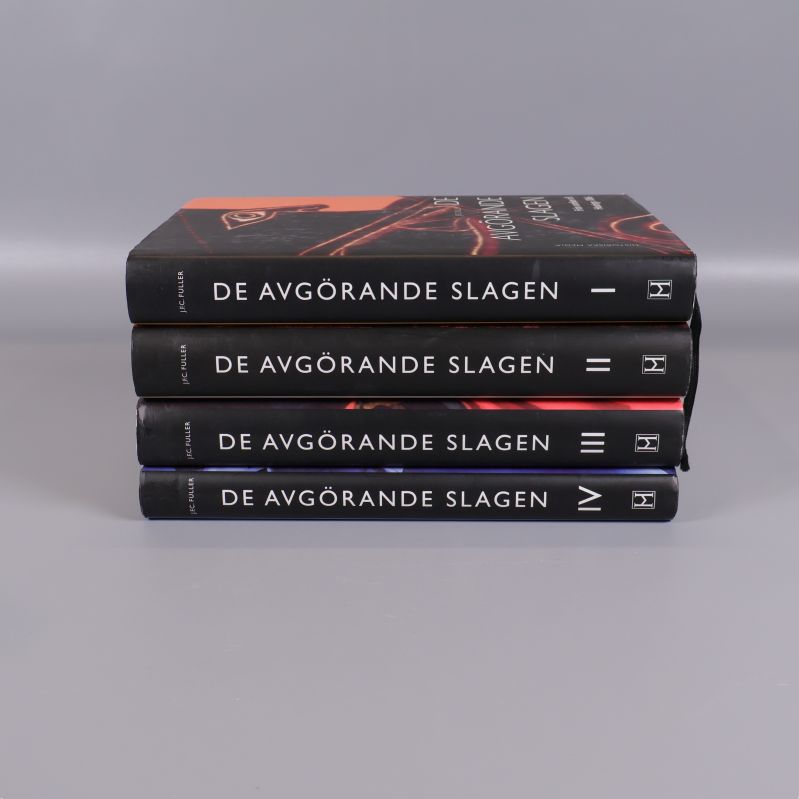 Böckerna De avgörande slagen staplade med synliga ryggar