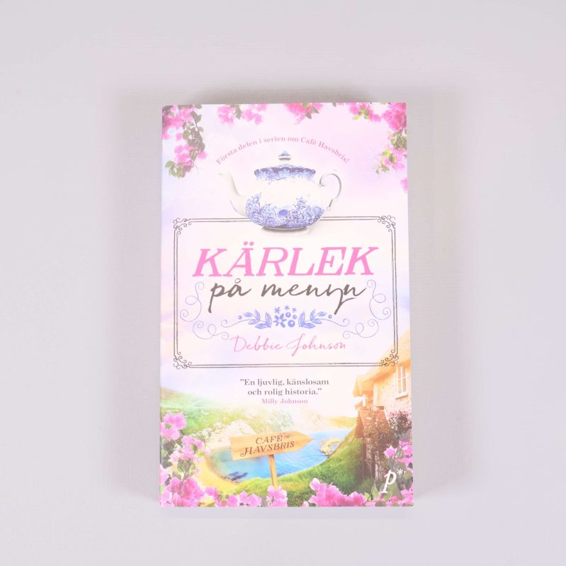 Framsidan av pocketboken Kärlek på menyn med färgglatt romantiskt motiv