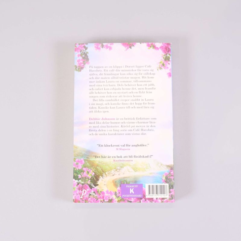Baksidan av pocketboken Kärlek på menyn med sammanfattning och blommor