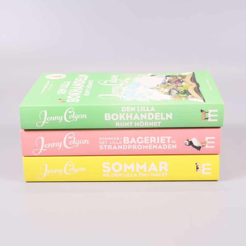 Ryggarna på tre Jenny Colgan pocketböcker staplade på varann