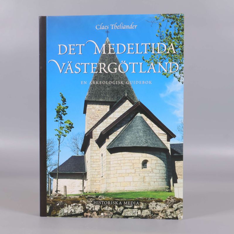 Framsida av boken Det medeltida Västergötland med kyrkobyggnad