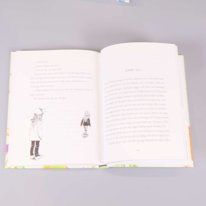 Uppslag ur en Kerstin-bok med text och illustration