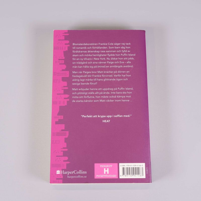 Baksida av boken Solnedgång i Central Park med text och ISBN