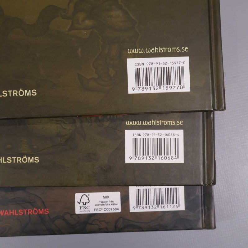 Tre andra baksidor på Legenden om Tann med tydliga ISBN-nummer