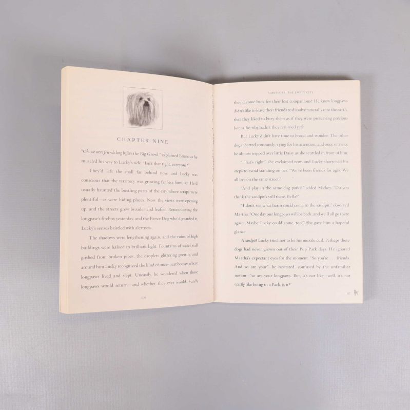 Uppslag ur Survivors-bok med hundillustration och engelsk text