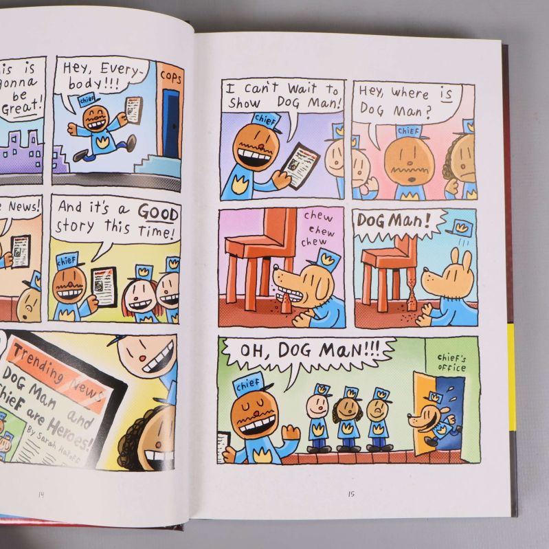 Uppslag med serierutor från boken Dog Man A Tale of Two Kitties