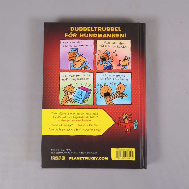 Baksidan av Hundmannen och de knepiga katternas kupp med serierutor och ISBN