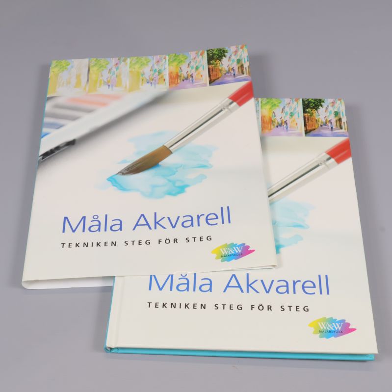 Två exemplar av boktitel Måla akvarell placerade på varandra