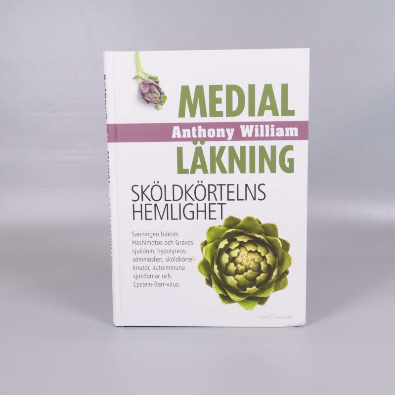 Medial läkning – Sköldkörtelns hemlighet upprätt stående mot grå bakgrund