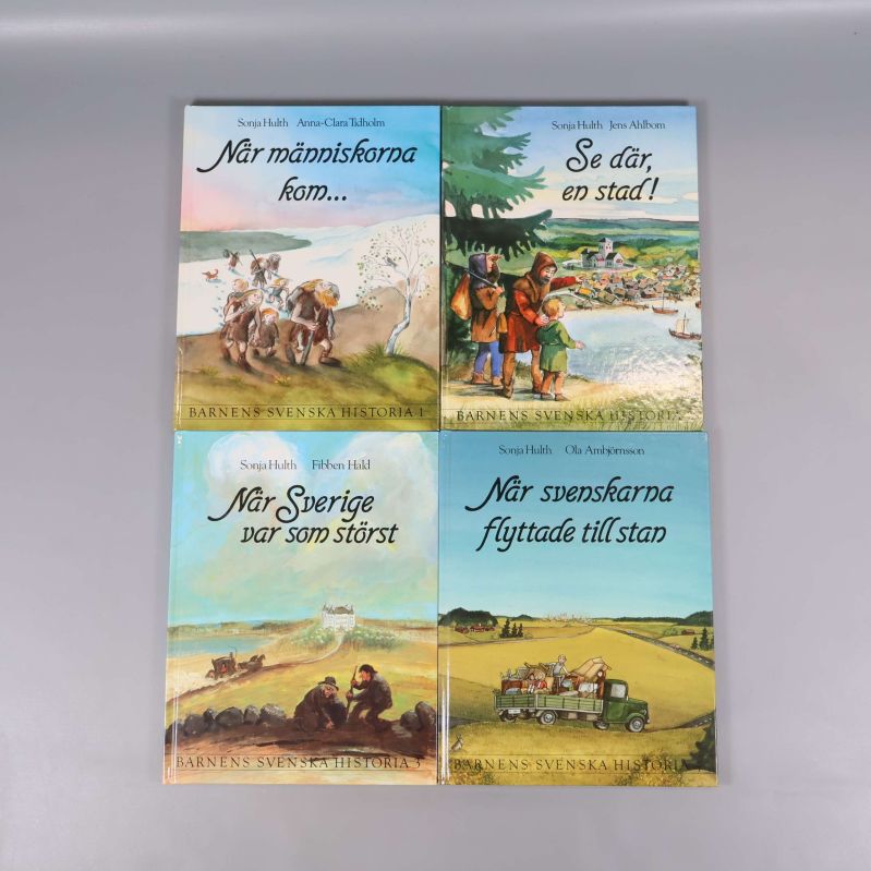 Framsidor av fyra böcker i Barnens svenska historia