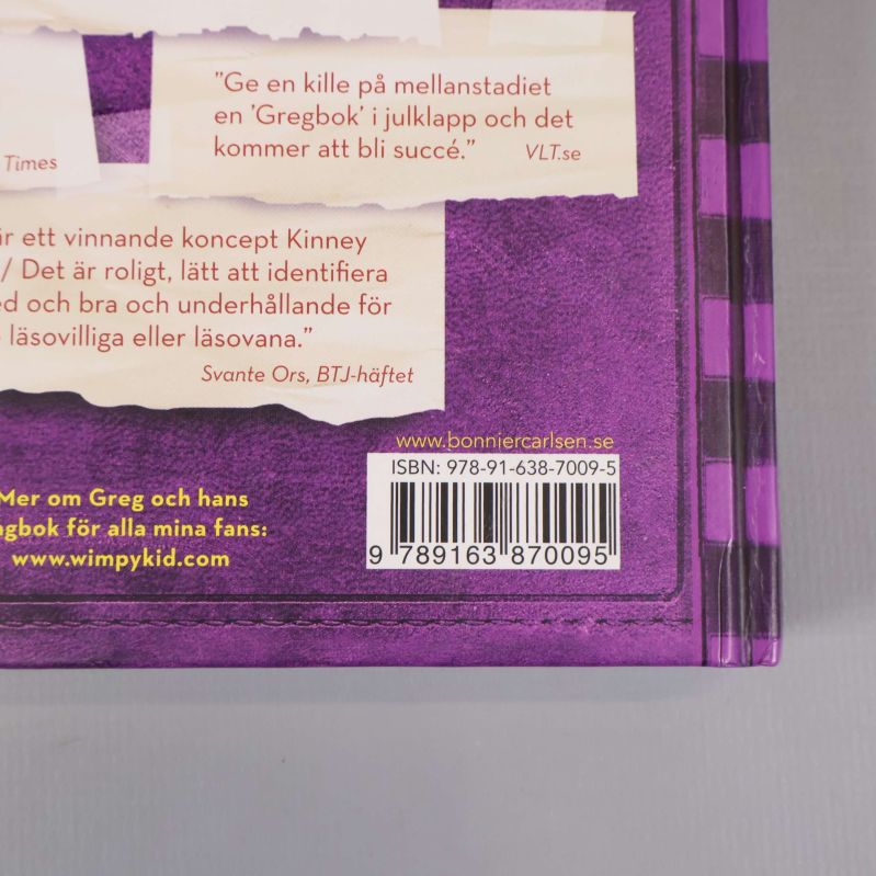Närbild på bokens baksida med synlig ISBN: 978-91-638-7009-5