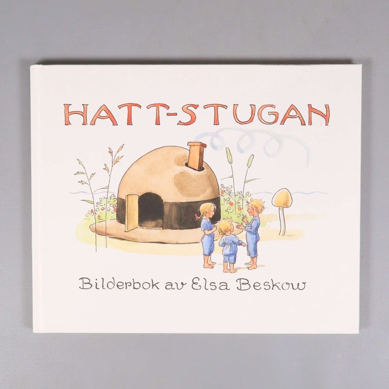 Omslag till boken Hattstugan med illustration av fyra barn och ett hus