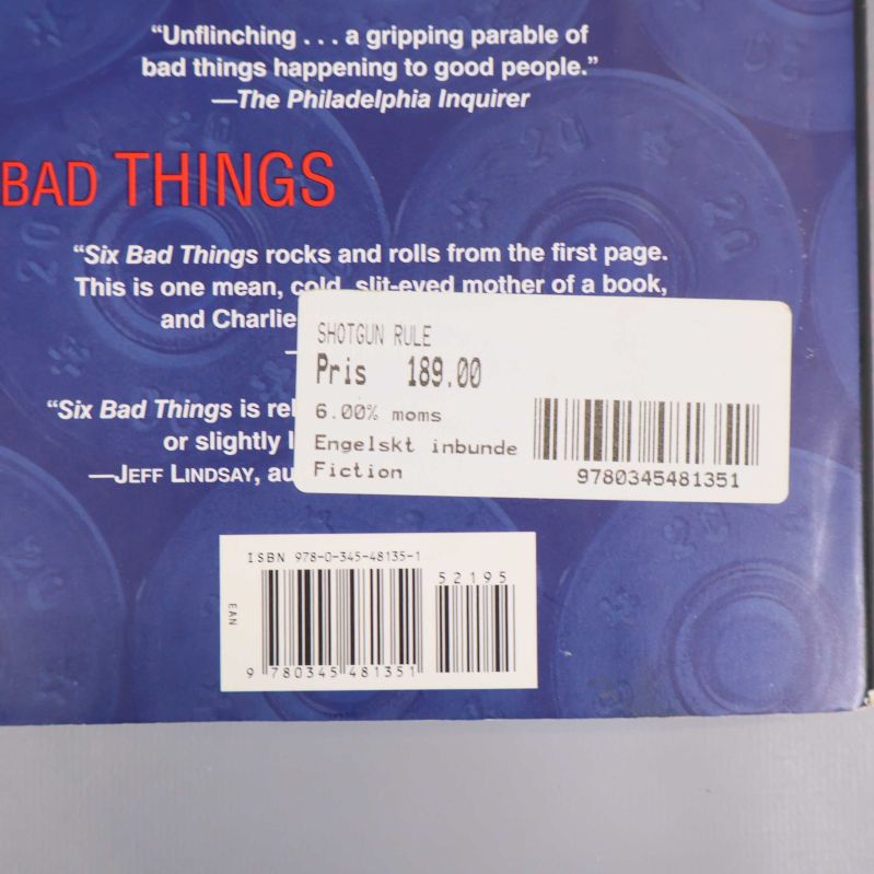 Närbild på baksidan av The Shotgun Rule med streckkod och ISBN