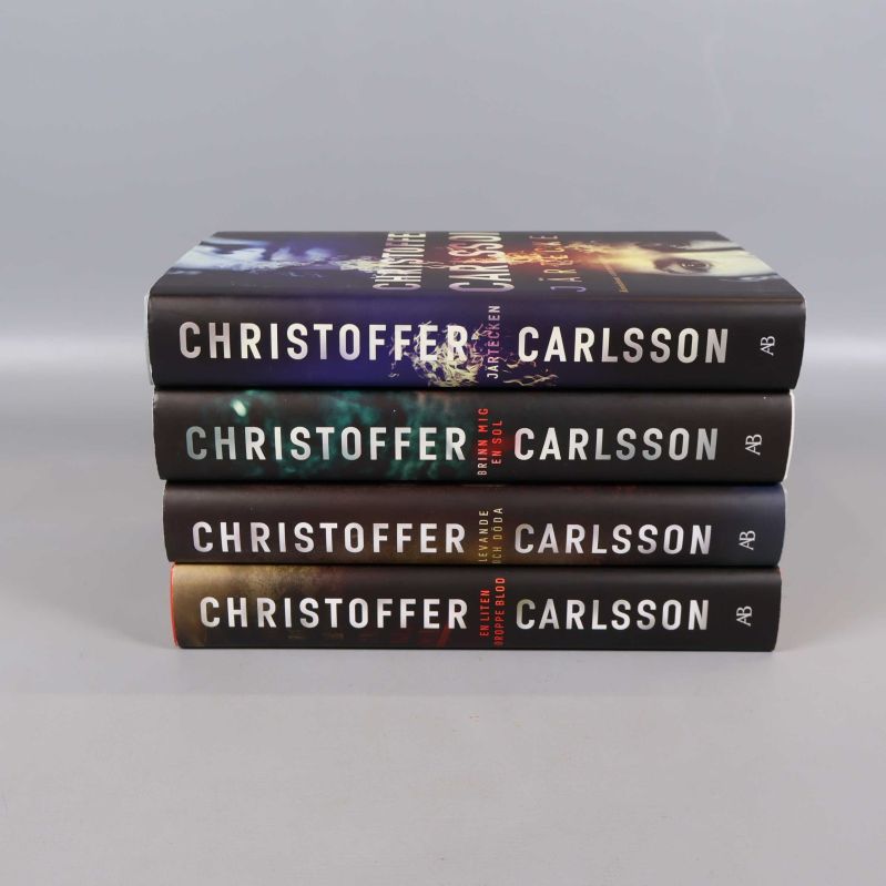 Bokryggar på Hallandssviten 1-4 staplade, alla av Christoffer Carlsson