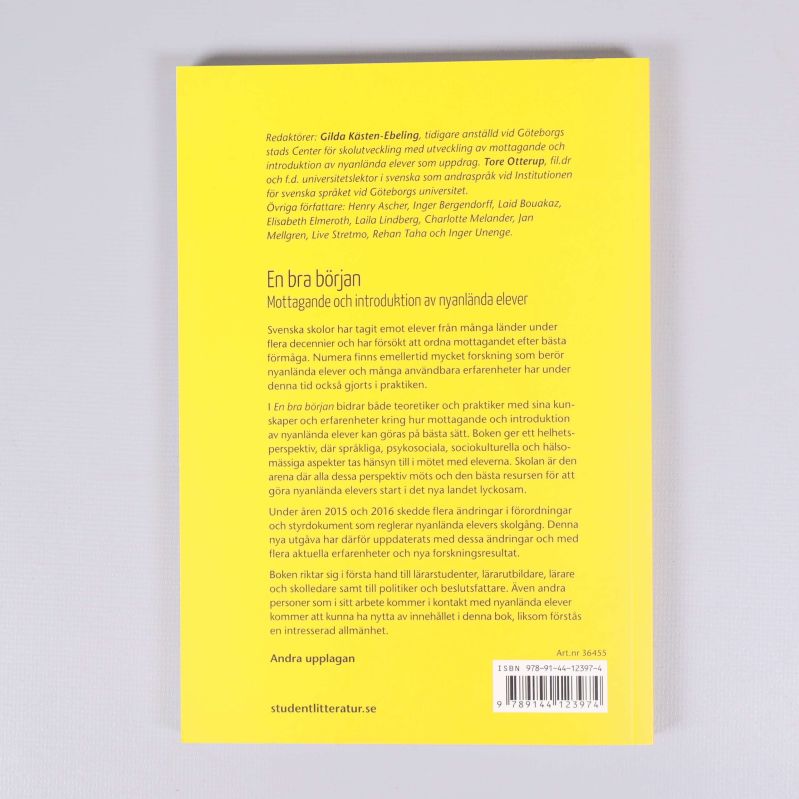 Baksidan av boken med beskrivande text och isbn-nummer
