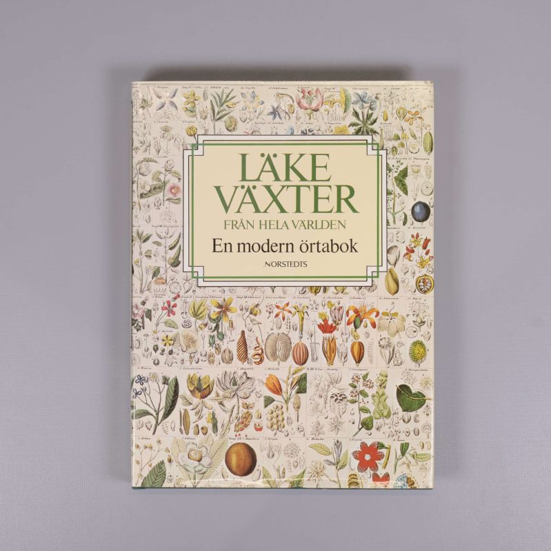 Omslaget till Läkeväxter från hela världen med illustrerade växtdetaljer