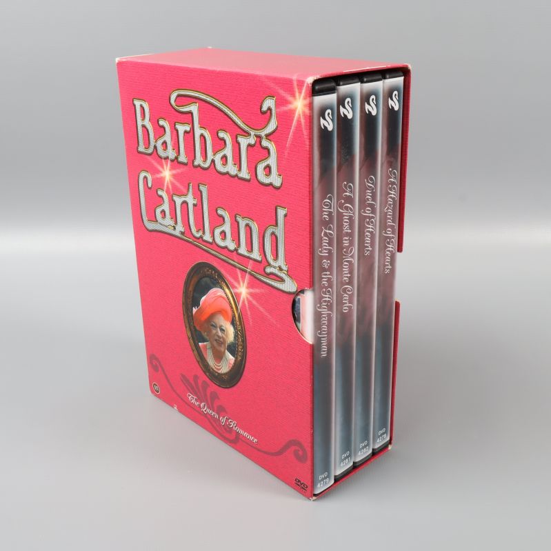 Halvöppen röd Barbara Cartland DVD-box med fyra filmer synliga