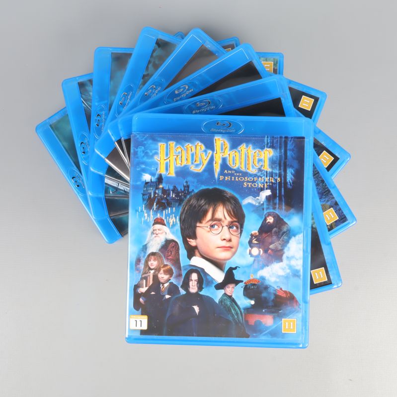 Alla åtta Blu-ray fodral utlagda och Harry Potter omslag