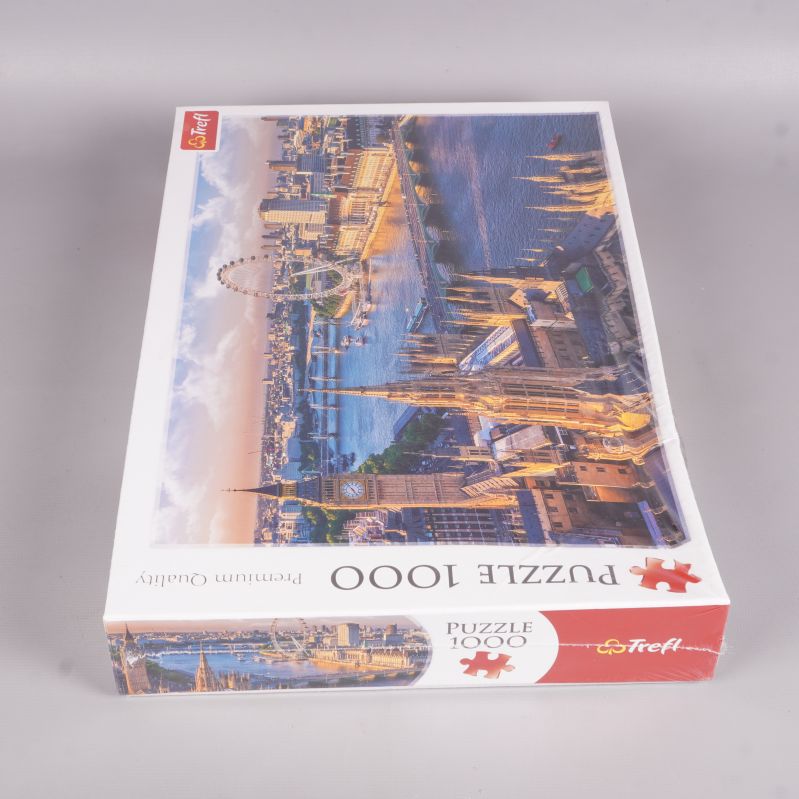 Pussellåda från ovan med Londonmotiv och Trefl-logga