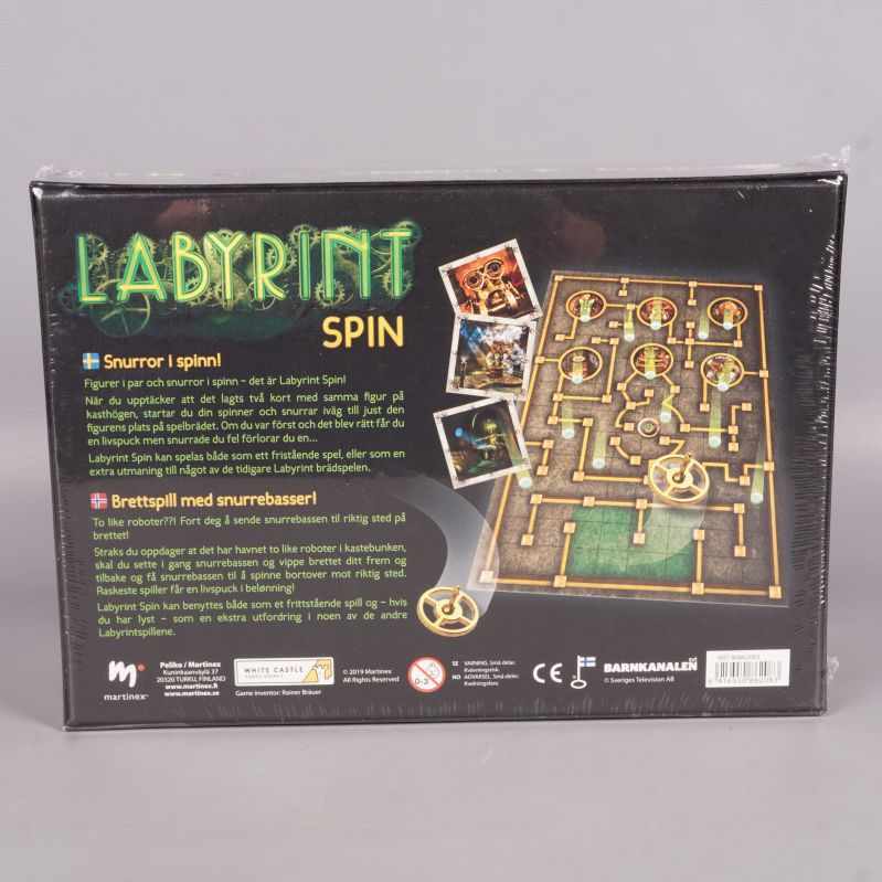 Baksida av Labyrint Spin med spelregler och komponenter