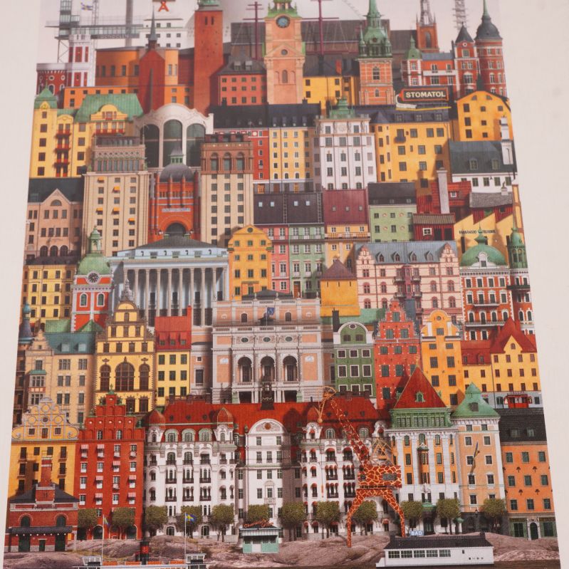 Närbild på pusslets illustration av Stockholms byggnader