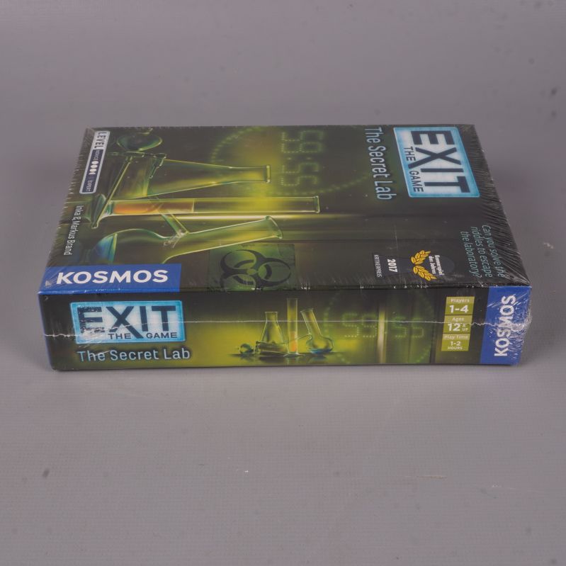 Sällskapsspel liggande på sidan med neonfärgade detaljer