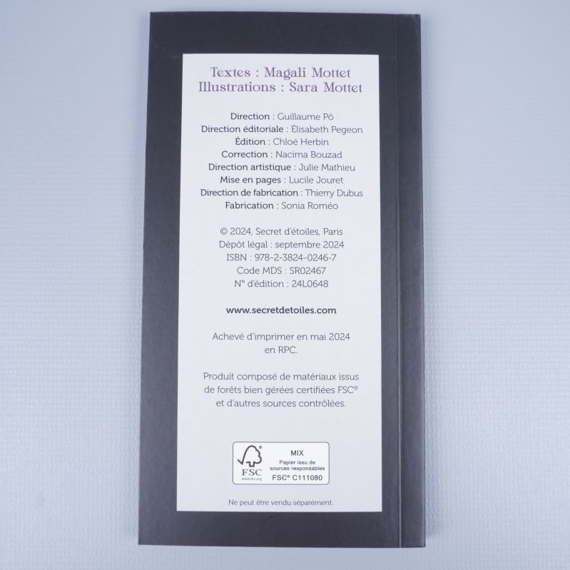 Baksida av guidebok med författarinformation och tryckår