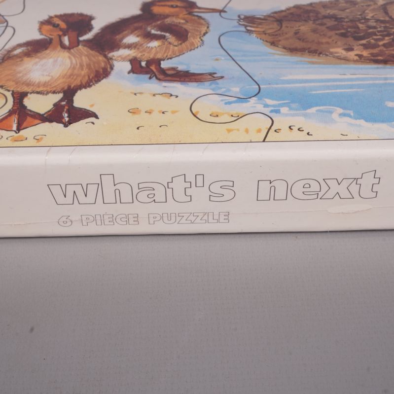 Text på lådan: what's next 6-piece puzzle