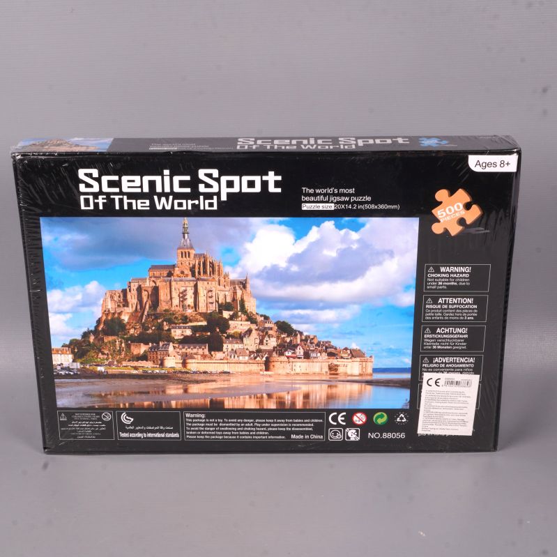 Baksida av pussellåda med information och motiv