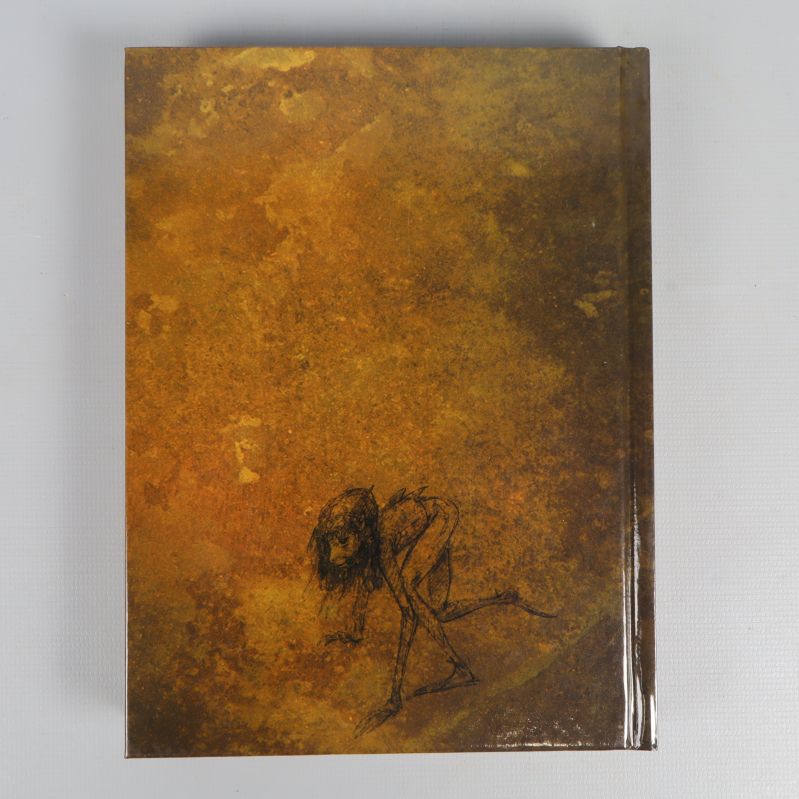 Baksidan av guideboken med brun marmorering