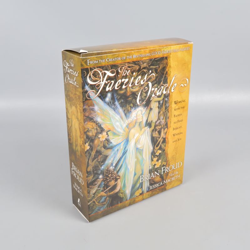 Ask till The Faeries' Oracle i guldiga och bruna färger