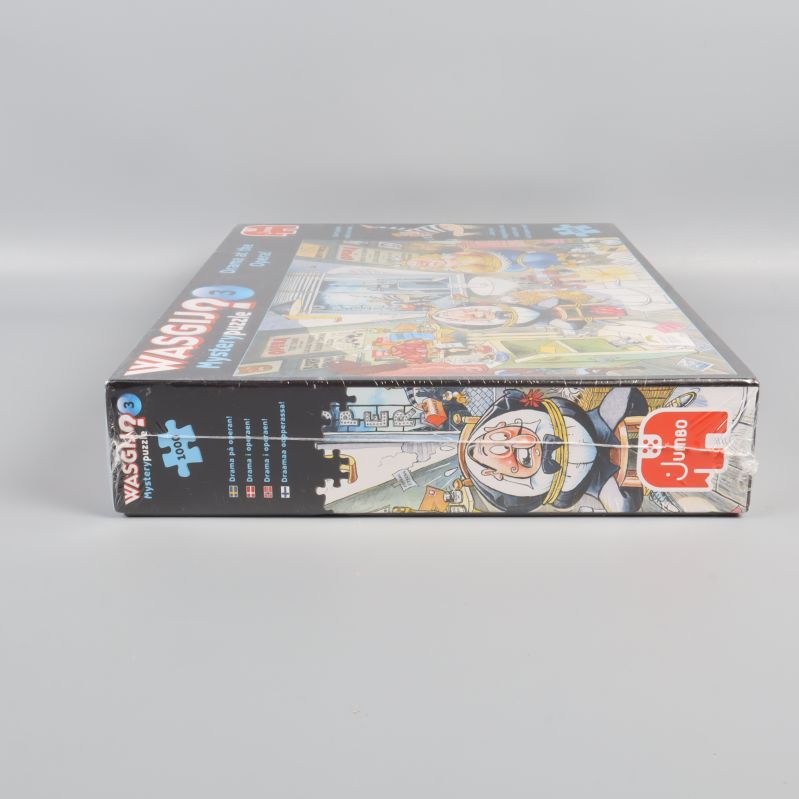 Sida på Wasgij Mysterypuzzle 3 med Jumbo-elefantlogotyp