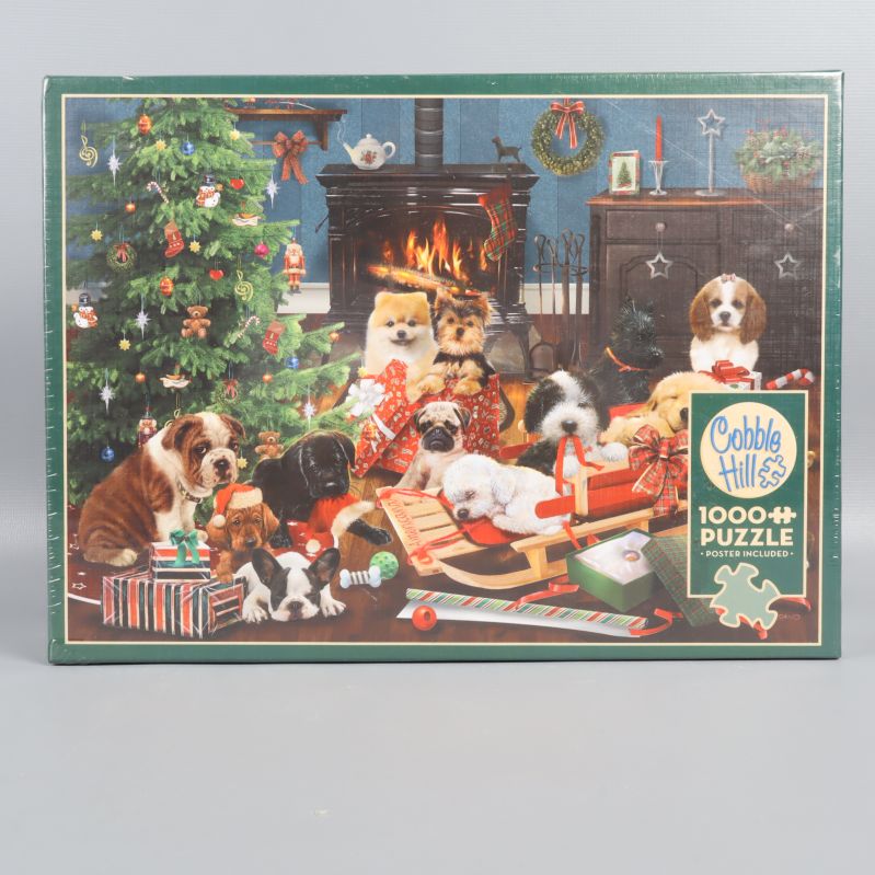 Pussellåda med illustration av hundar vid julgran