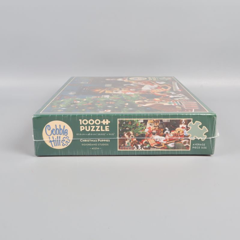 Kortsida av Cobble Hill pussellåda med 1000 bitar och motiv