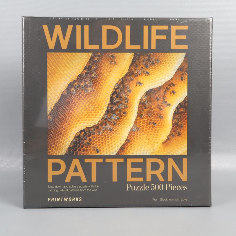 Framsidan av pussellåda wildlife pattern med naturmotiv