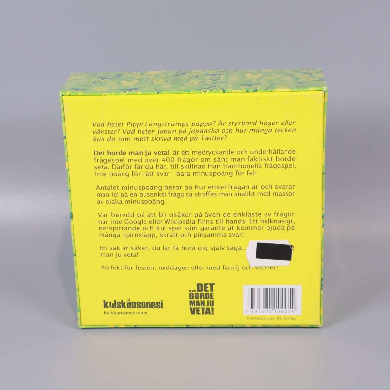 Baksidan av sällskapsspelet med beskrivning och logotyp