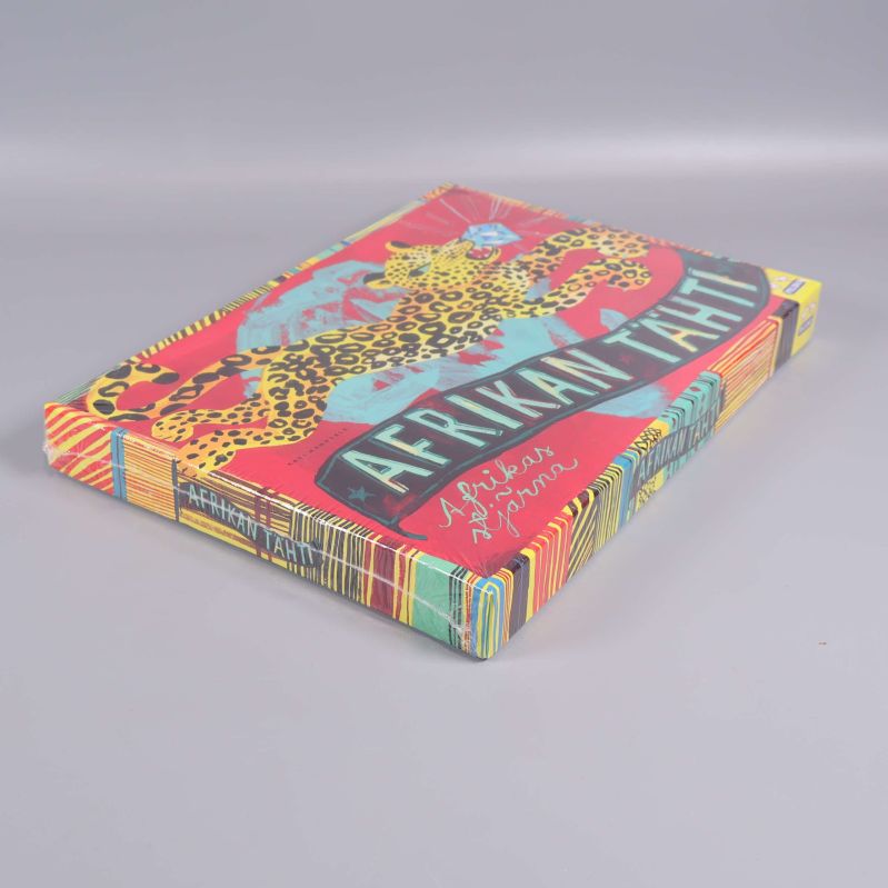 Brädspelet Afrikas stjärna i profilvy med mönstrad låda