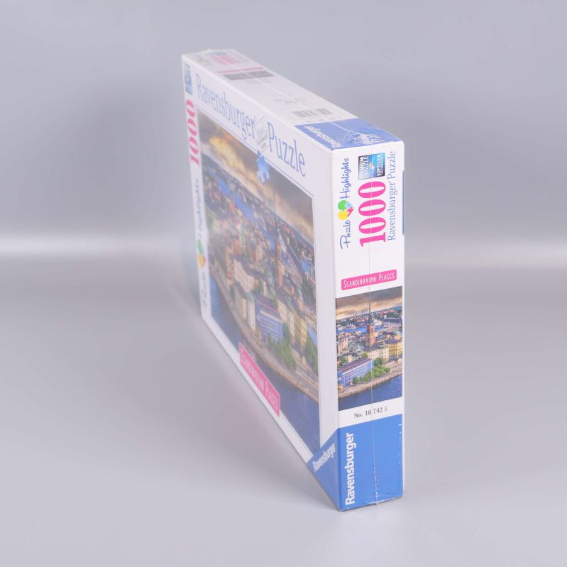 Andra sido­vyn på pussellåda med motiv och detaljer