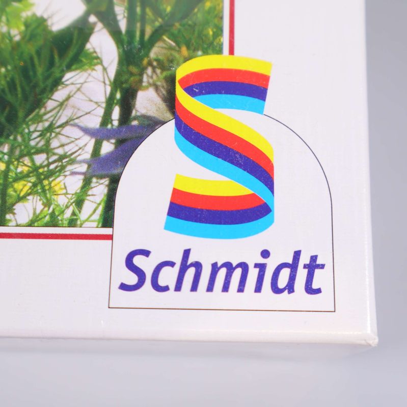 Närbild av Schmidt-logotyp med regnbågsfärger