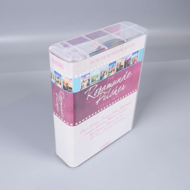 DVD-boxen öppnad visar flera skivor inuti genom genomskinlig plast