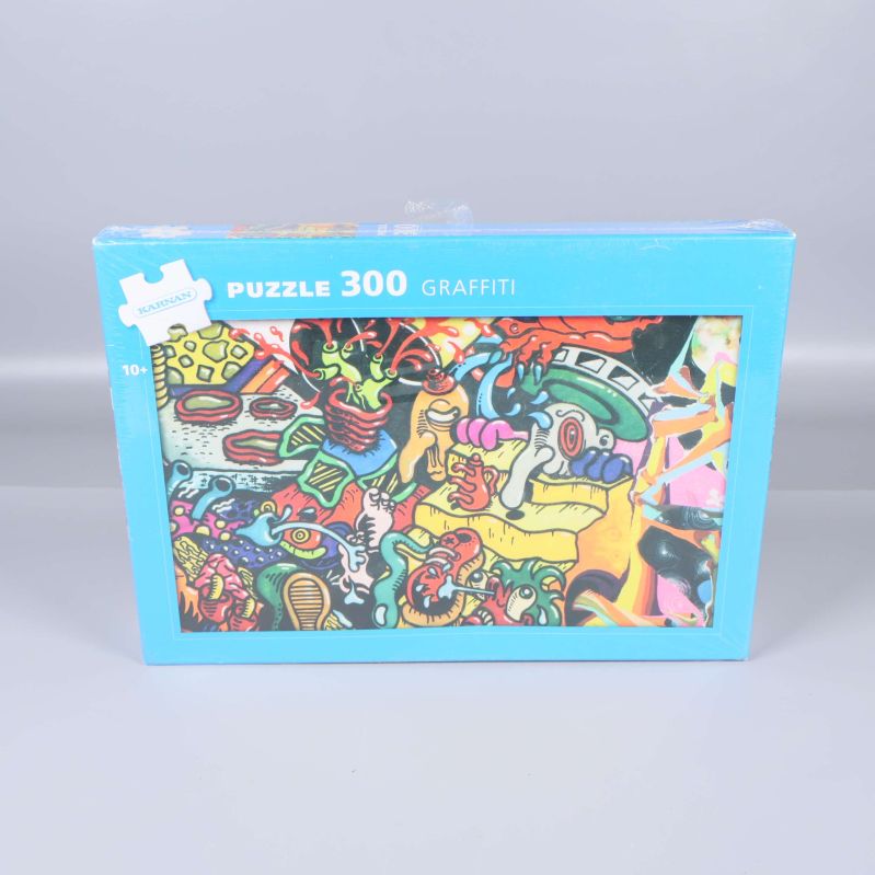 Framsida av pusselask med färgglatt graffiti motiv och 300 bitar