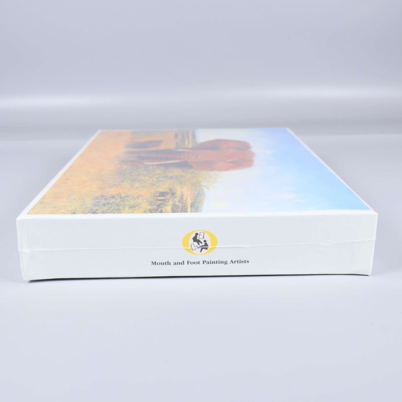 Smal sida av pussellådan med logo och texten Mouth and Foot Painting Artists